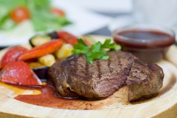 Beef Steak - Gourmet Restaurant Food, background. Shallow depth