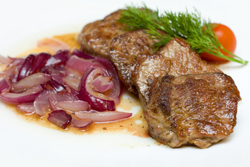 Veal Medallions with Onion on White - Gourmet Restaurant Food