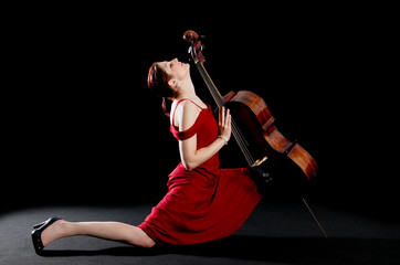 Woman dancing the tango with a cello