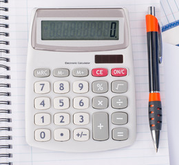 Calculator and pen