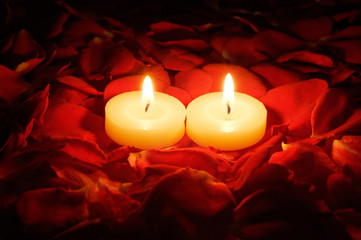 candles on rose petals