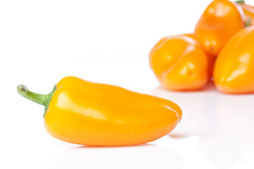An orange baby pepper