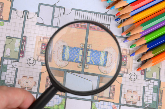 House plan,magnifier and color pencils