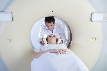 Woman going through CT test