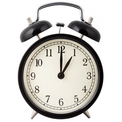 Old Alarm Clock, in black and white, showing one o'clock.