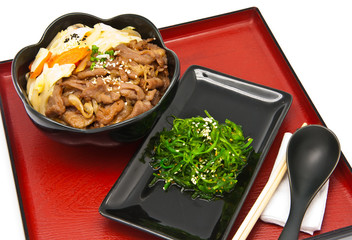 rice with fried pork and seaweed Salad
