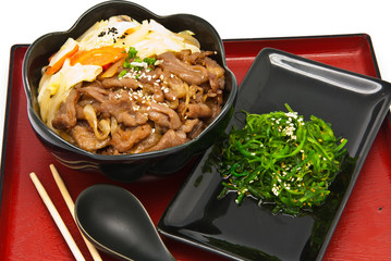 rice with fried pork and seaweed Salad