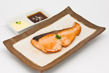 Salmon fish grilled in the plate