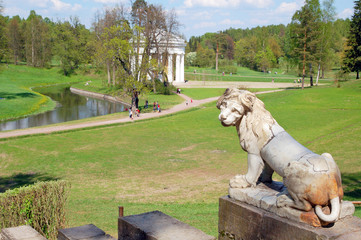 Sculpture of a lion against park in Pavlovsk