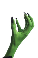 Witch's green hand, white background.