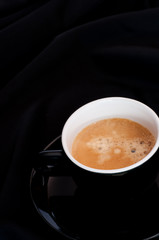 Cup of Coffee on Black Background