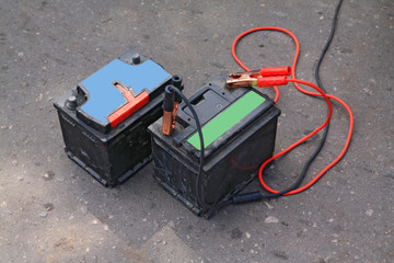 old electric batteries on road