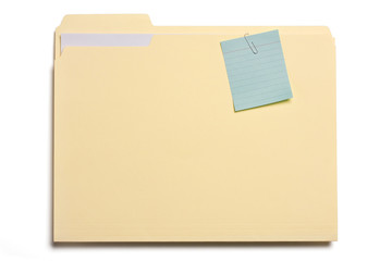 File folder with note clipped on it on white