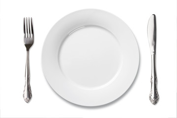 white china plate with silver fork and knife isolate on white
