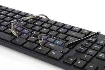 Computer keyboard and eye glasses