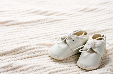 Baby shoes and blanket