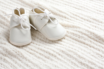Baby shoes and blanket