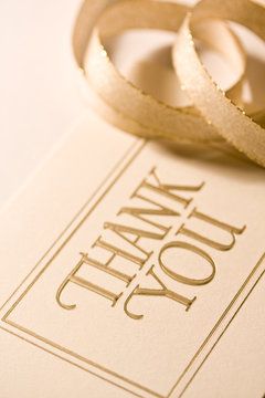Close up of thank you card with ribbon