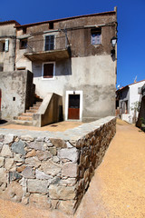 Village house with stone wall courtyard in France