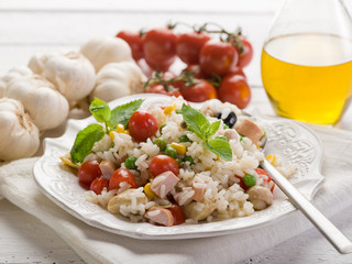 rice salad with fresh tomatoes on dish