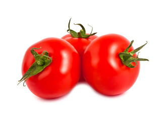 Three red ripe tomatoes
