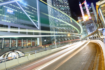 Fototapeta na wymiar Traffic through the city at night