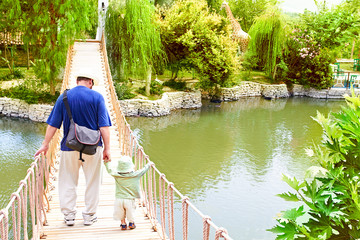 father and son on bridge