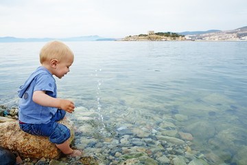 little boy in the sea