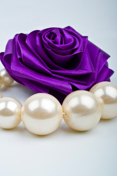 pearls and artificial roses