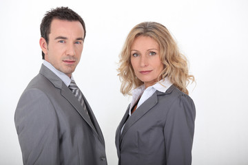Couple in gray suit on white background
