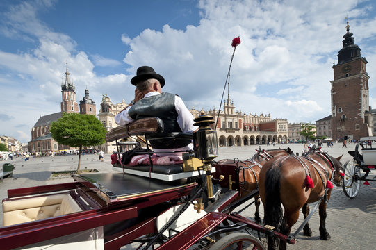 Fototapeta Cabby man on the Old Town square in Krakow, Poland
