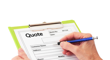 Hand with Pen Writing a Quote