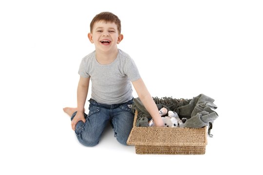 Little boy laughing playing