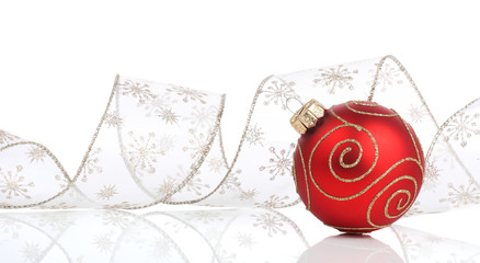 Red christmas bauble with ribbon