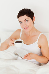 Cute woman drinking coffee