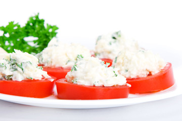 Sliced tomato with cheese sauce