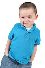 Cute little boy posing for camera on white background