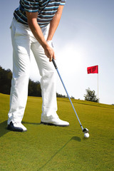 Fototapeta premium Man playing golf