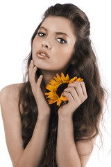 beautiful girl posing with a sunflower