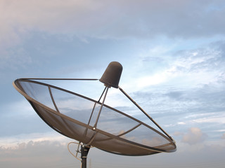 satellite dish in evening sky