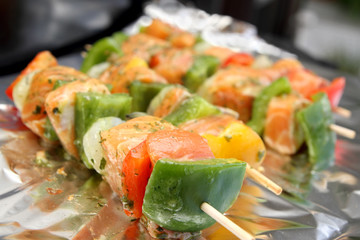 Sticks with grilled salmon and shrimps