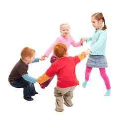 Children playing kids game holding hands in circle