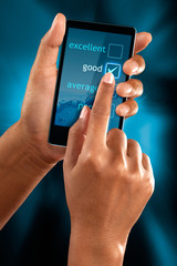 A woman use a mobile phone to select a option