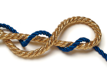 golden and blue ropes on white
