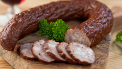 Dried sausage on chopping board