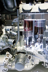 Grey metallic gears bucket in car motor