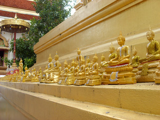 Collection of small Buddha figures at Thai Buddhist temple