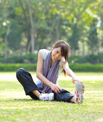 woman doing stretching exercise © leungchopan