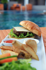 hamburger at hotel pool