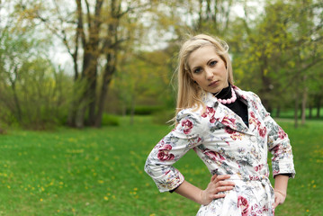 portrait of blonde girl in the park